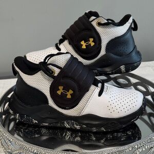 Under Armour Kids' Black and White Sneakers with Gold Accents